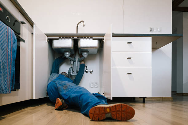 Professional Plumbing technician working in Higdon, AL